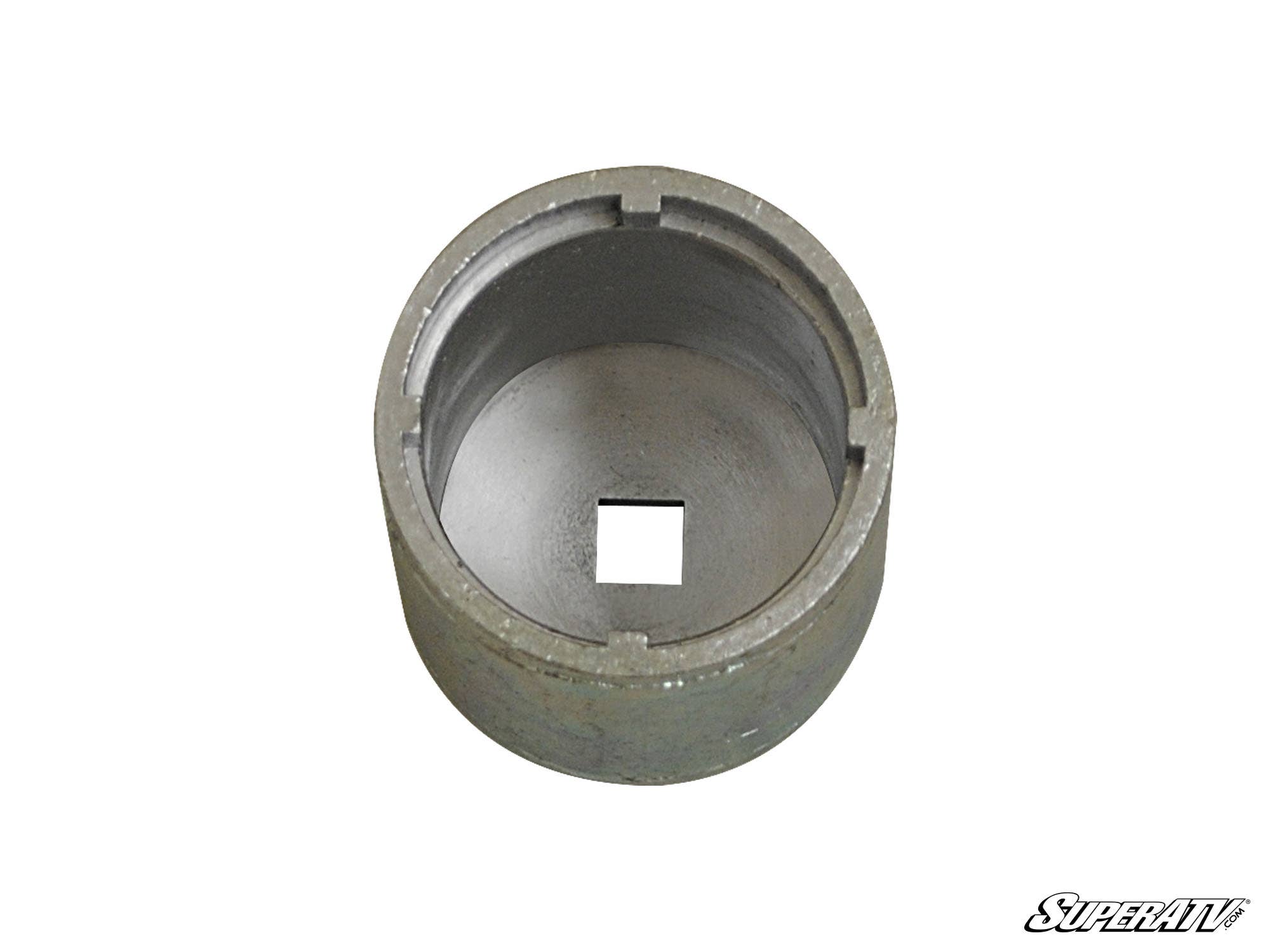 The Can-Am Renegade Trailing Arm Spanner Socket is a metal, cylindrical tool with a hollow center, square hole at the base, and four notches on the rim. The SuperATV logo appears in the bottom right corner on a white background.