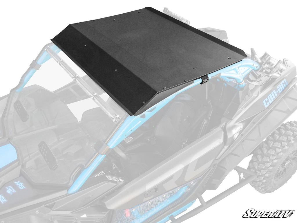 A Can-Am Maverick X3 with a black metal SuperATV Aluminum Roof is shown on a blue off-road side-by-side; the roof covers the top frame, while the rest of the vehicle appears semi-transparent gray. SuperATV logo is in the bottom right corner.