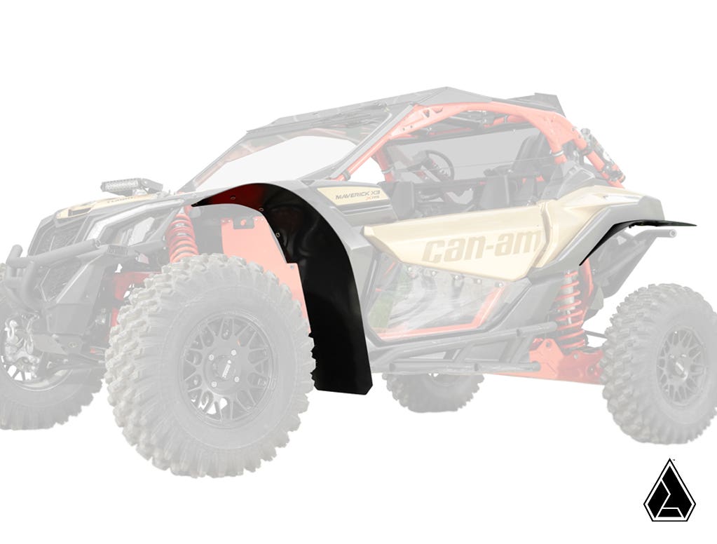 A digitally rendered black Assault Industries Low-Profile Fender Flare is shown on a semi-transparent Can-Am Maverick X3 above the front tire, with a small triangular logo in the lower right corner.