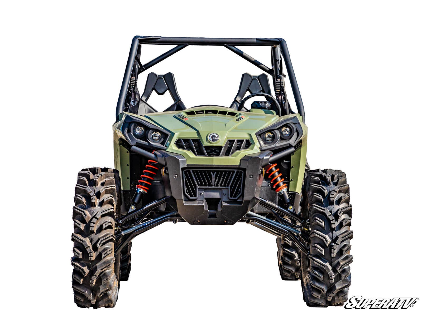 Front view of a green UTV equipped with a Can-Am Commander 6 Lift Kit, featuring large rugged tires, orange shock absorbers, and a roll cage. Seats are visible inside; SuperATV logo appears on the white backgrounds bottom right.