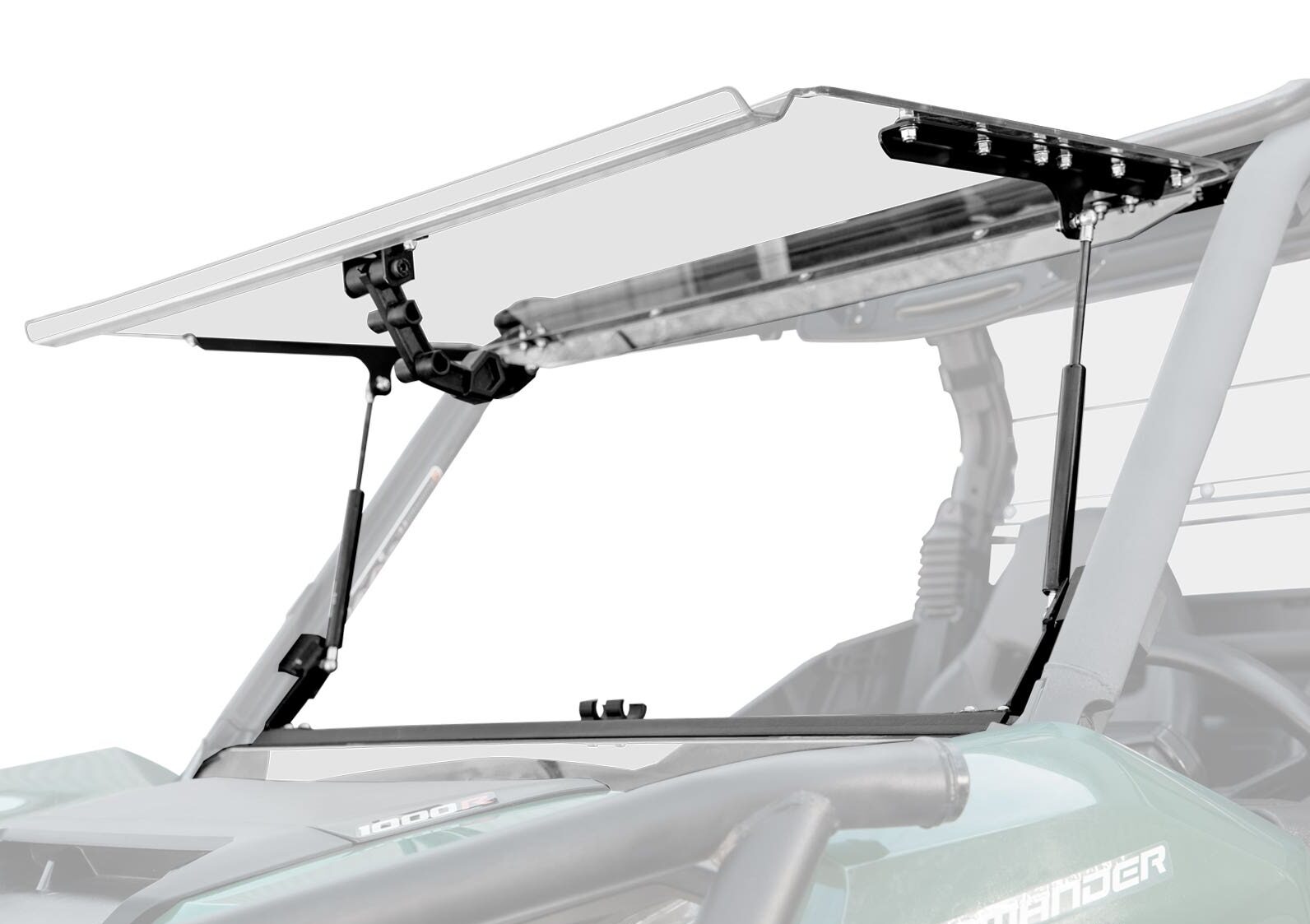 A Can-Am Maverick Sport Flip Windshield, made of clear polycarbonate, is mounted on an off-road vehicle. Hinged and partially open with black brackets and gas struts, it reveals the green hood and roll cage behind.
