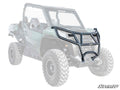 The Can-Am Commander Front Bumper, a black heavy-duty model with angled bars and an integrated grille guard, is displayed over a semi-transparent off-road utility vehicle. The SuperATV logo appears in the bottom right corner.