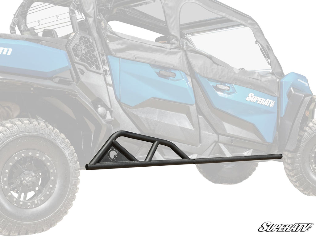 A black Can-Am Commander Max Tree Kicker is shown angled in front of a blue off-road utility vehicle with large tires and black accents, providing side protection. The SuperATV logo appears in the bottom right corner.