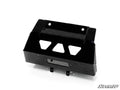 The Can-Am Maverick Trail Winch Mounting Plate is shown—a black, rectangular metal bracket with angled sides, triangular cutouts, and multiple mounting holes. The SuperATV logo appears in the bottom right corner against a white background.