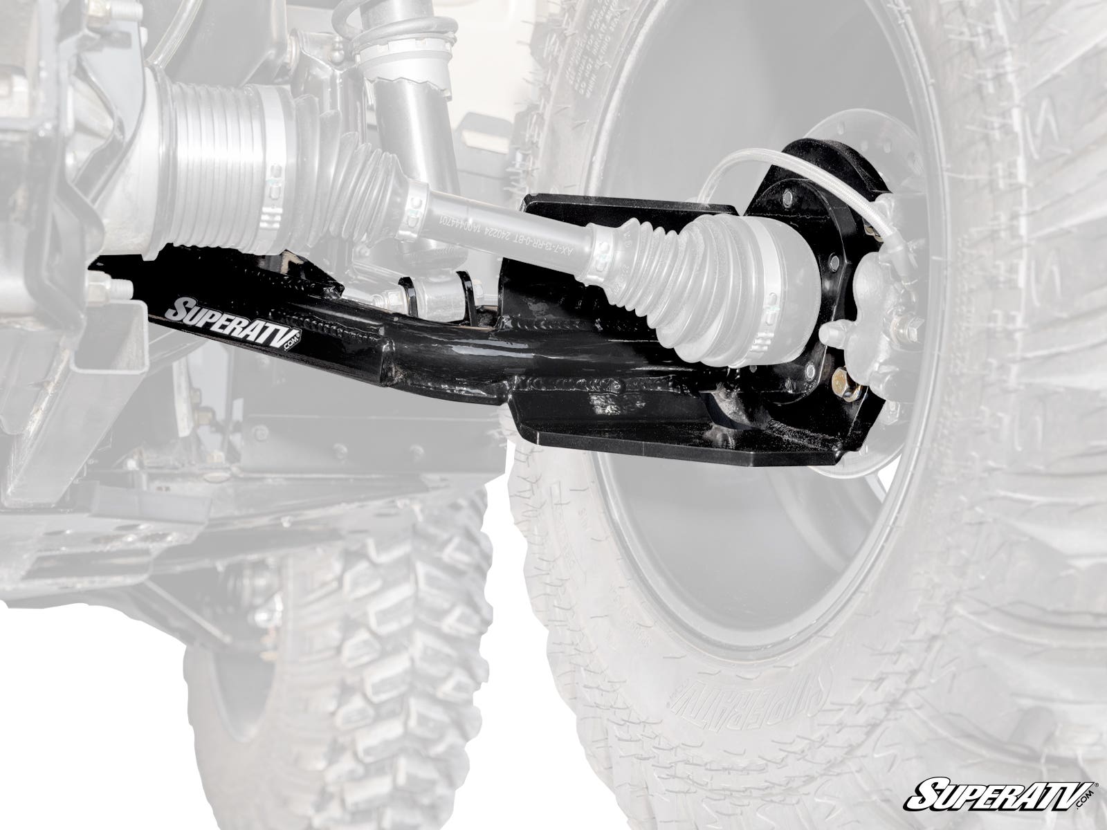 Close-up view of black Can-Am Outlander High-Clearance 2 Rear Offset Trailing Arms labeled SuperATV, attached to a UTV’s rear wheel assembly, with the wheel and suspension parts partially visible in the background, highlighting the trailing arms.