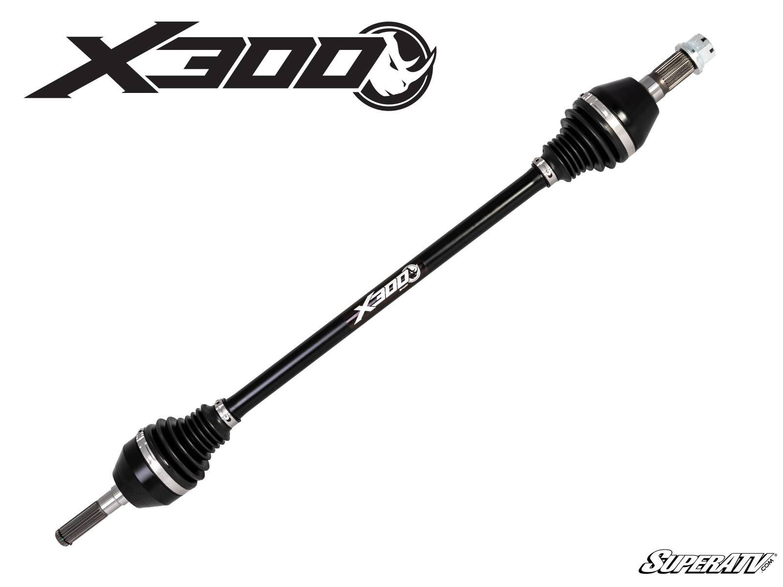 A Can-Am Maverick X3 Big Lift Kit Heavy-Duty Axle X300, black with metal ends and rubber boots, is displayed diagonally on a white background. The X300 logo appears in the top left; the SuperATV logo is in the bottom right.