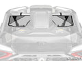 Close-up rear view of a Can-Am Maverick R with the SuperATV Rear Windshield installed. The clear, two-panel windshield is secured to the roll cage with black mounting straps and features the SuperATV logo in the bottom right corner.