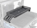 A black metal CFMOTO UForce 1000 Bed Rack Delta with side vents is mounted above the cargo bed of a blue UTV. The rack’s structure and position are highlighted against a partially faded background.