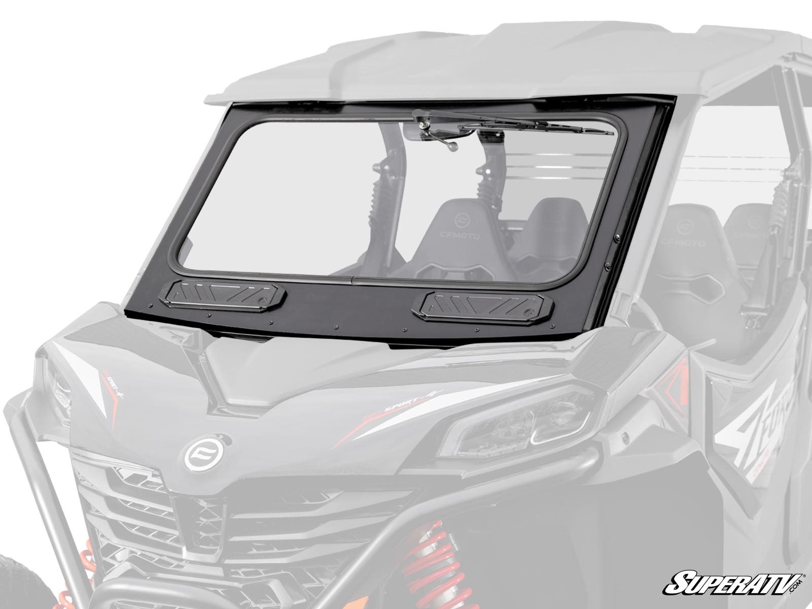 A close-up of a rugged CFMOTO ZForce 950 Trail Glass Windshield with two vent openings, framed in black and featuring a single top-center wiper, installed on a black off-road vehicle. The SuperATV logo appears in the bottom right corner.