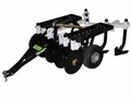The Chisel Plow Till-Ease Model 543 is a black and white metal farm implement with two wheels, sharp disc blades, and pronged tines, designed for soil tilling and attaches to a tractor or ATV for agricultural use.
