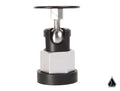 The Assault Industries Magnetic Swivel Mount features a precision-engineered hexagonal silver base, black circular bottom, central sphere connecting the parts, a rotating black handle on top, and a white background with a small black geometric logo bottom
