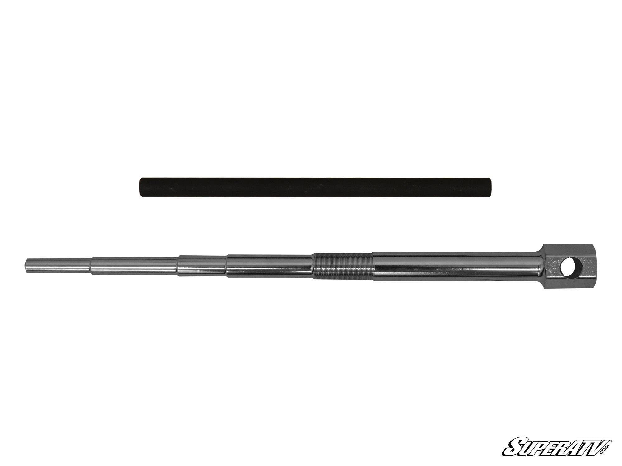 Two metal rods are displayed on a white background: the top is black and cylindrical, the bottom is a silver stepped rod with varying diameters, middle threading, and a holed rectangular end. Polaris Primary Clutch Puller. SuperATV logo at bottom right.