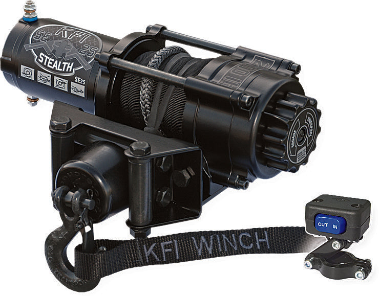 A black Stealth 2500 Winch with a hooked cable, mounting bracket, and remote control with IN/OUT buttons. It has KFI WINCH on the strap and features a rugged, cylindrical motor housing.