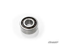 A single silver cylindrical bearing from the Polaris RZR Front Differential Bearing and Seal Kit rests on a white background. Its inner and outer rings are visible, with a metallic finish. The SuperATV logo appears in the bottom right corner.