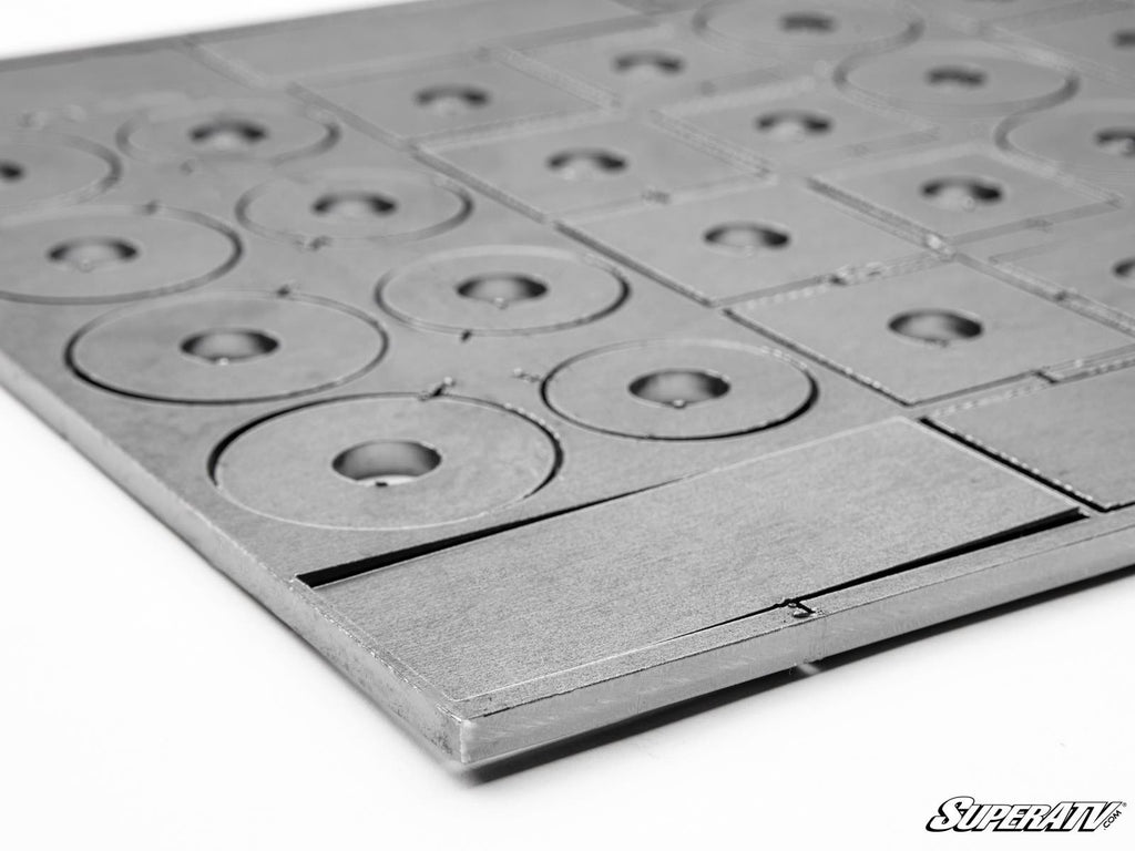 A close-up of the Universal Weld-In Gusset Kit shows gray foam with pre-cut circular and rectangular shapes, each with a center hole and scored outlines. The SuperATV logo appears in the bottom right corner.