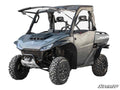 The Segway Fugleman UT10 2 Lift Kit is shown installed on a gray off-road utility vehicle with a roof, rugged tires, side doors, front winch, black grill, and Fugleman branding—built for rough terrain and outdoor use.