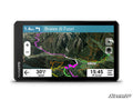 The Garmin Tread 26 Powersport Navigator shows a detailed topo map with colorful trails, blue route line, 30 km/h speed, arrival time of 15:45, terrain and elevation info. Braies di Fuori is displayed as the destination 1.4 km ahead.
