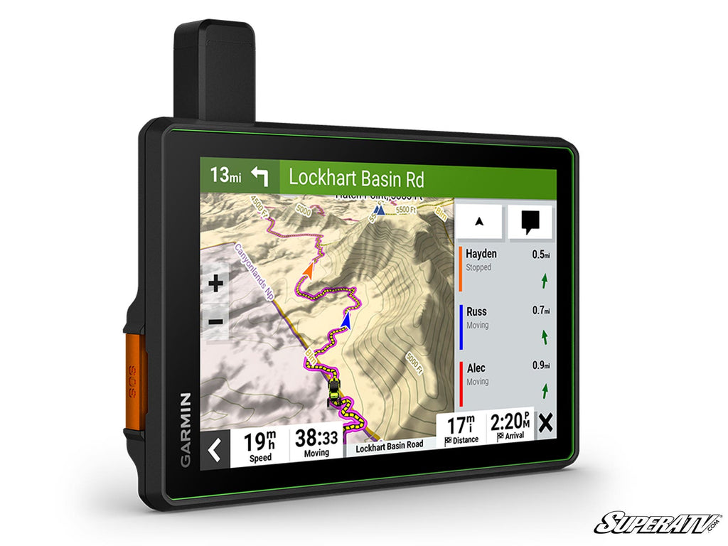 The Garmin 8 Tread Powersports Navigator - SxS Edition displays a Lockhart Basin Road trail map with rider locations, route, speed, distance, elevation, weather info on a bright screen with side buttons and a black frame.