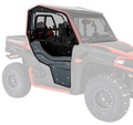 A sharply focused Polaris General Scratch Resistant Full Door with a clear window is installed on the driver’s side of a red and black off-road utility vehicle, while the rest of the vehicle appears faded to highlight the door.