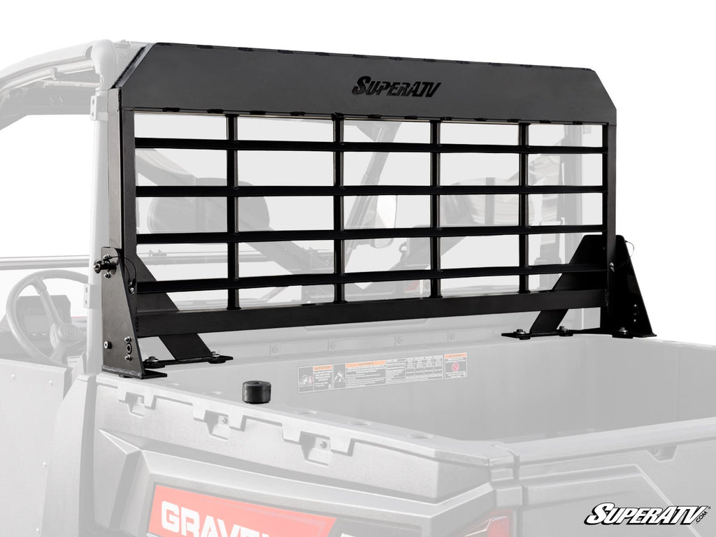 The Gravely Atlas JSV Headache Cargo Rack is a black metal rack with the SuperATV logo, mounted behind the cab of a red and black GRAVELY UTV to provide cargo bed protection.