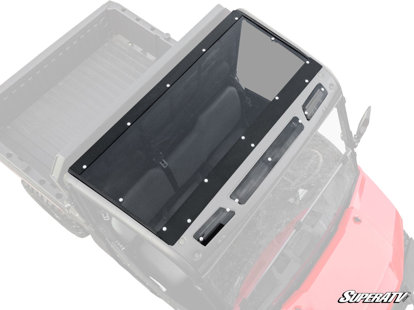 The Gravely Atlas JSV 3400 Tinted Roof, a translucent black panel with evenly spaced edge bolts, is installed on a red off-road utility vehicle. Viewed from above, it covers the cabin with seats and dashboard partially visible through it.