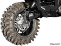A close-up of a Honda Rubicon 6 Portal Gear Lift shows its large, rugged off-road tire with deep treads on a metal suspension against a white background. The SuperATV logo appears in the bottom right corner.