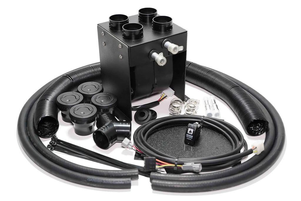 The Honda Pioneer 1000 MAXX Edition Cab Heater with Defrost (2016-Current) kit includes a black metal heater unit, wiring, hose clamps, four ducts, flexible hoses, connectors, knobs, and mounting hardware arranged on a white background.