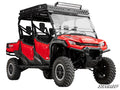 A Honda Pioneer 1000-6 equipped with a 3 Lift Kit, featuring rugged off-road tires, a roof rack with LED light bar, clear windshield, open half doors, black accents, and Pioneer 1000 branding on the side.