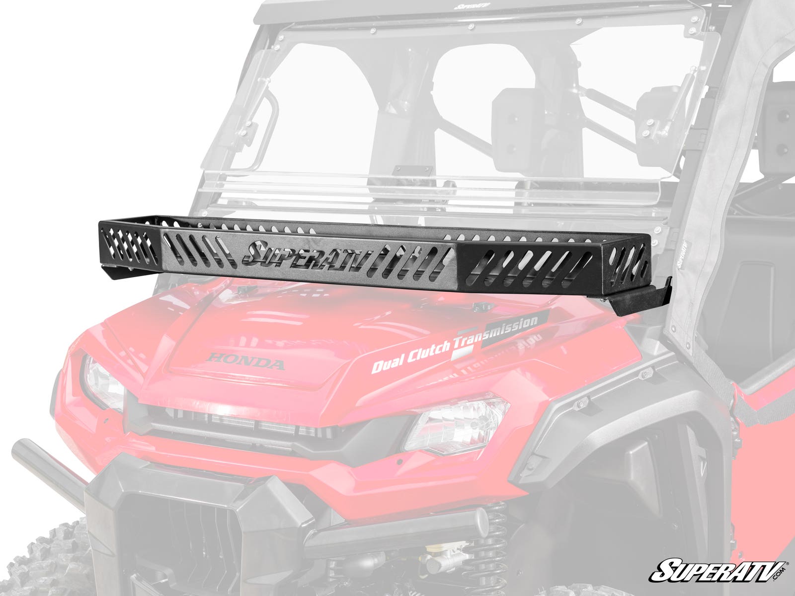 A Honda Pioneer 1000 Hood Rack Bravo, featuring a vented black metal design, is mounted above the windshield of a red Honda utility vehicle. The front grill, headlights, and “Dual Clutch Transmission” label are visible with the SuperATV logo bottom right.