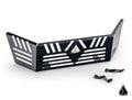The Assault Industries Honda Talon 1000 Bed Enclosure is a black metal panel with angular lines, multiple slotted cutouts, and a geometric logo at the center. Two small black metal brackets are included. The background is plain white.