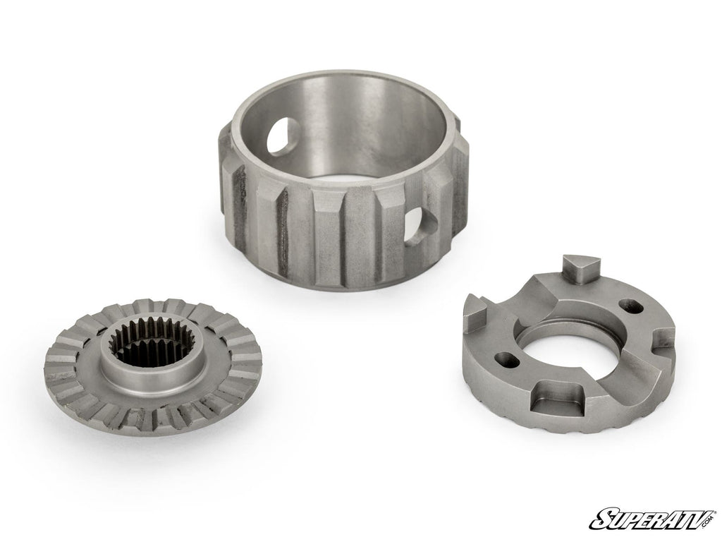 Three metal components of the Honda Talon 1000 Differential Locker are shown on a white background, including a splined gear, grooved cylindrical ring, and notched circular piece. The “SuperATV” logo appears in the bottom right corner.