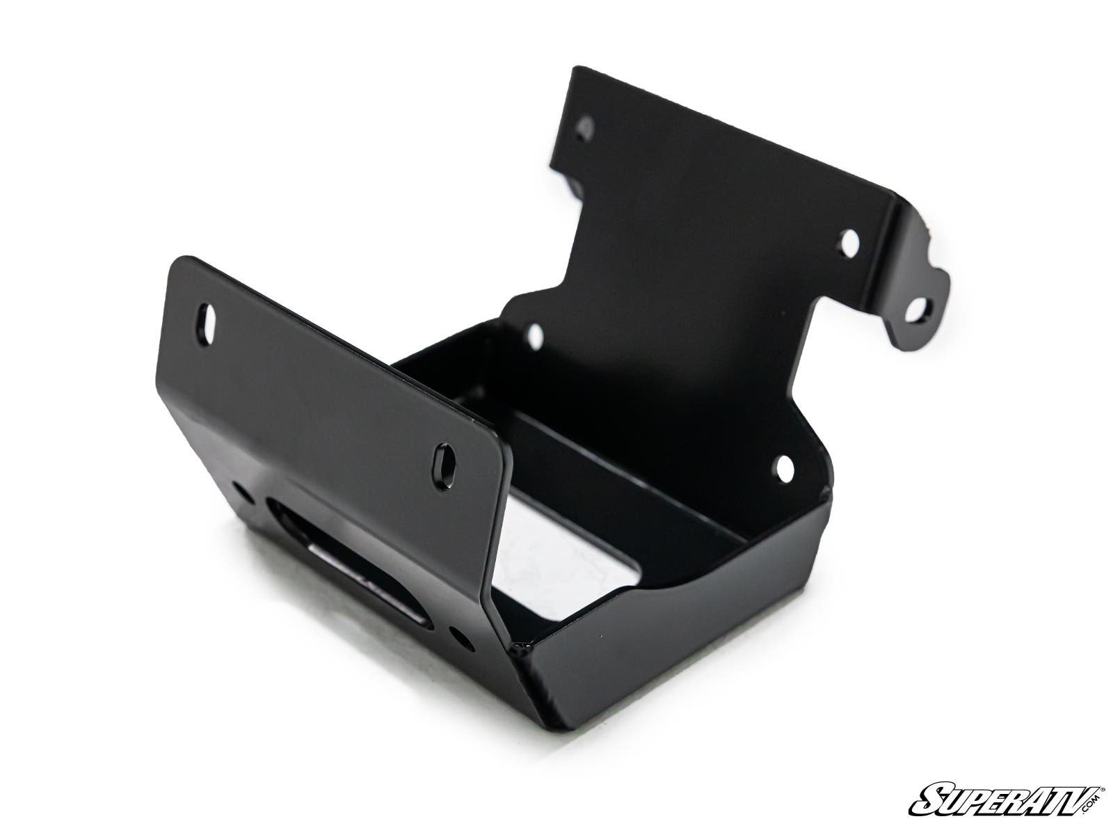 The Honda Foreman Winch Mounting Plate is a black metal bracket with multiple screw holes, angled sides, and a reinforced base. It is shown on a white background with the SuperATV logo in the bottom right corner.