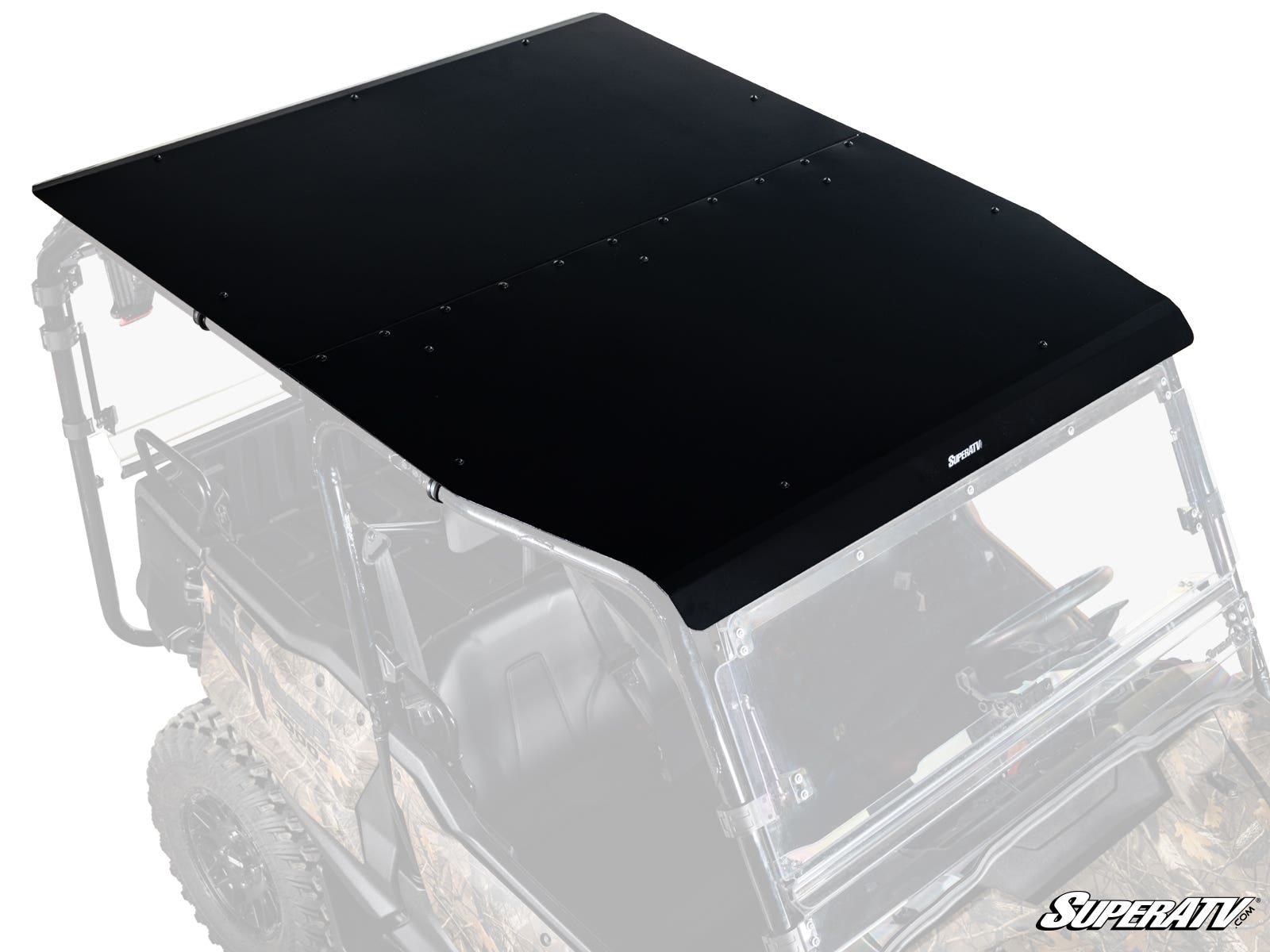 A matte black Honda Pioneer 1000-5 Aluminum Roof with exposed edge and center bolts is mounted on a camo UTV with a partial roll cage. The SuperATV logo appears at the front and bottom right corner of the rectangular metal roof.