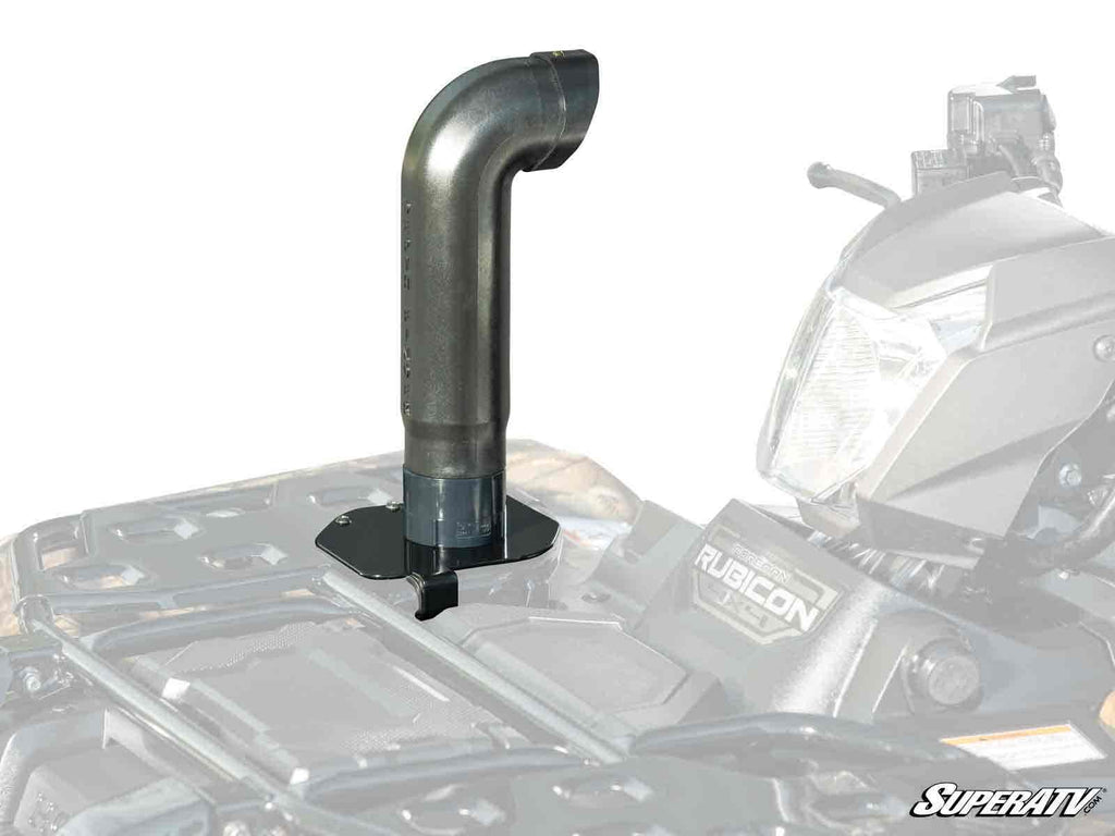 A close-up of the Honda Rancher 420 Depth Finder Snorkel Kit installed on an ATV’s front rack, showing the headlight and Rubicon label in the background. The SuperATV logo appears at the bottom right.