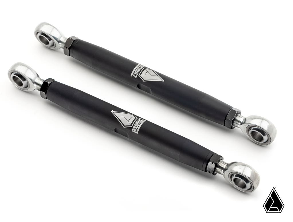 Two black Assault Industries Heavy Duty Rear Sway Bar End Links for Honda Talon, featuring silver rod ends and a geometric white and silver logo at the center, are displayed diagonally on a white background. A small triangular logo is in the lower right c
