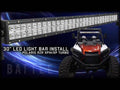 A 30 LED Combination Spot / Flood Light Bar is shown above a red and black Polaris RZR XP/XP Turbo on a dark, swirling blue background. Text: “30” LED LIGHT BAR INSTALL POLARIS RZR XP/XP TURBO”.