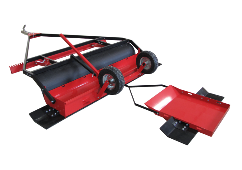 The ATV/UTV Ski Track Maker Tracker 230 is a red and black drag box with two wheels, a handlebar, metal attachment tray, roller, and angled fins—designed for spreading and leveling materials on flat surfaces.