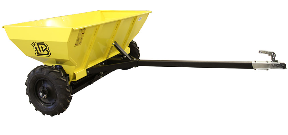 The ATV/UTV Sand & Gravel Spreader / Gritter IB G2 PRO 500 is a yellow metal utility cart with two large black wheels, a deep rectangular bed, a long black tow bar with a silver hitch, and a black logo on the side for hauling materials.