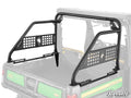 The John Deere Gator XUV 835 Sport Accessory Bar, a black metal rack with mesh panels, is installed on the utility vehicles cargo bed to protect the rear window and cab with sturdy side bars and an open grid design.