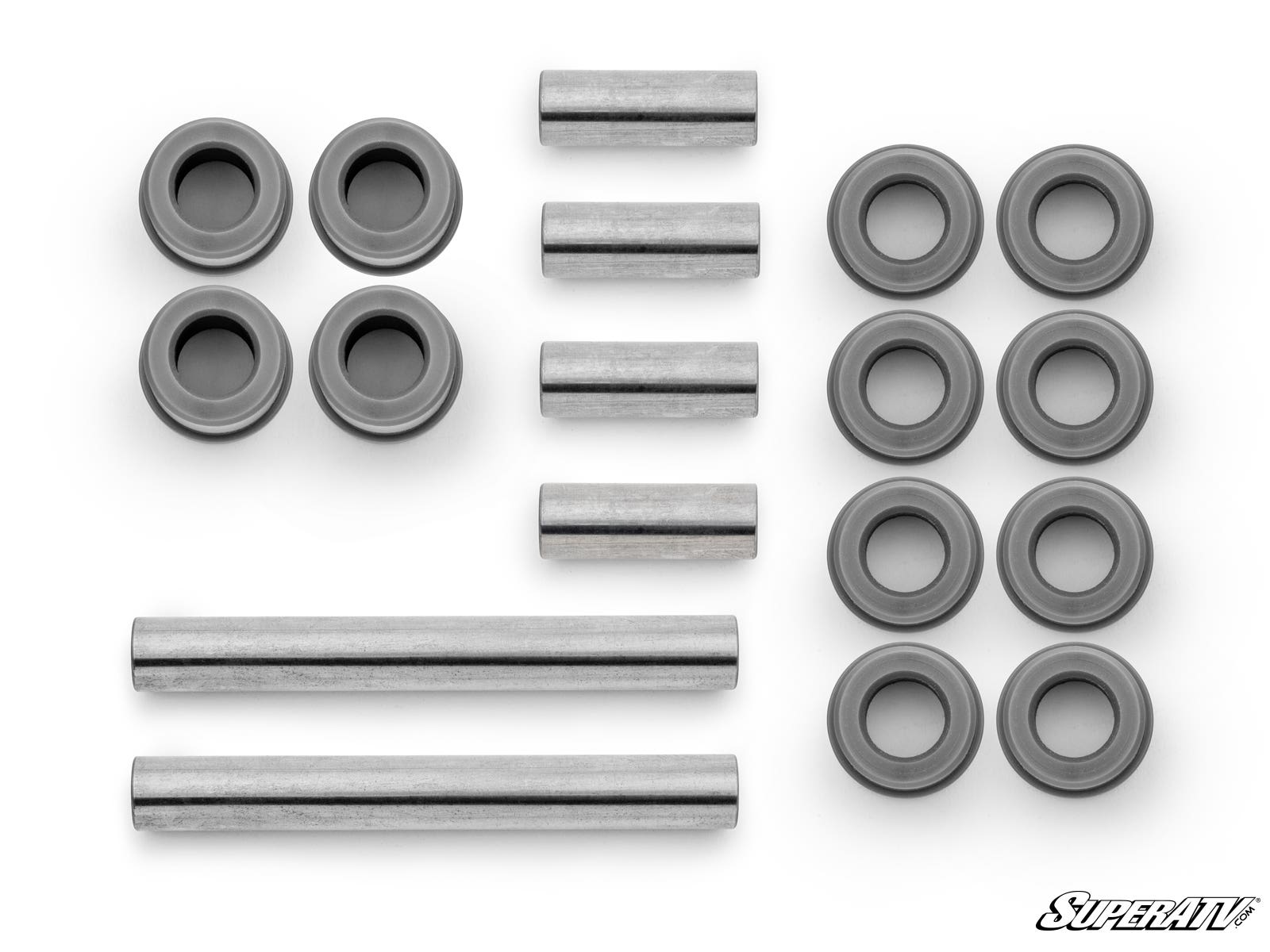 Kawasaki Brute Force 750 A-Arm Bushings are displayed on a white background, showing various metal spacers, sleeves, and bushings in different shapes and sizes. The SuperATV logo is visible in the lower right corner.