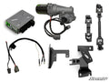 The Kawasaki Mule PRO-MX Power Steering Kit is shown on a white background with all components—electronic control box, wiring harness, motor unit, metal brackets, and linkage rods—arranged separately. The SuperATV logo appears in the lower right corner.