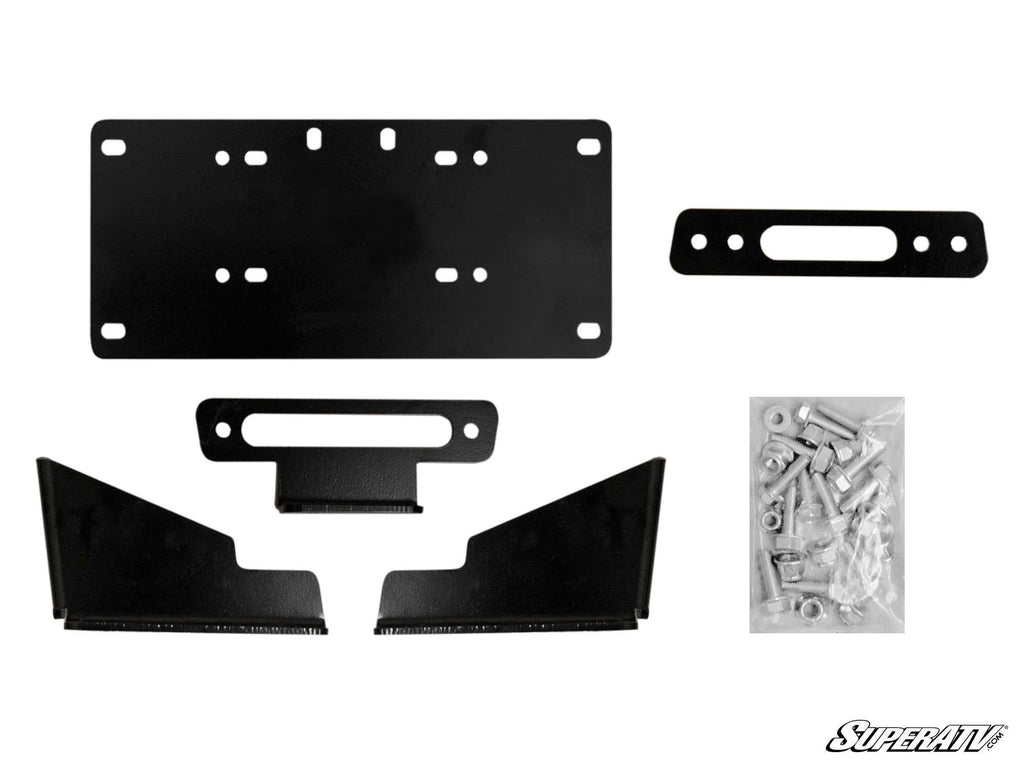 The Kawasaki Mule Pro Winch Mounting Plate includes black metal mounting brackets, a rectangular license plate holder, a winch fairlead plate, corner brackets, and a bag of screws and bolts. SuperATV logo appears in the bottom right on a white background.