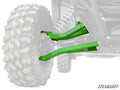 A vivid green Kawasaki Teryx KRX 1000 1.5 Forward Offset Boxed A-Arm suspension system is featured on the front wheel of an off-road vehicle, with the rest of the vehicle and tire faded in gray. The SuperATV logo appears in the bottom right corner.