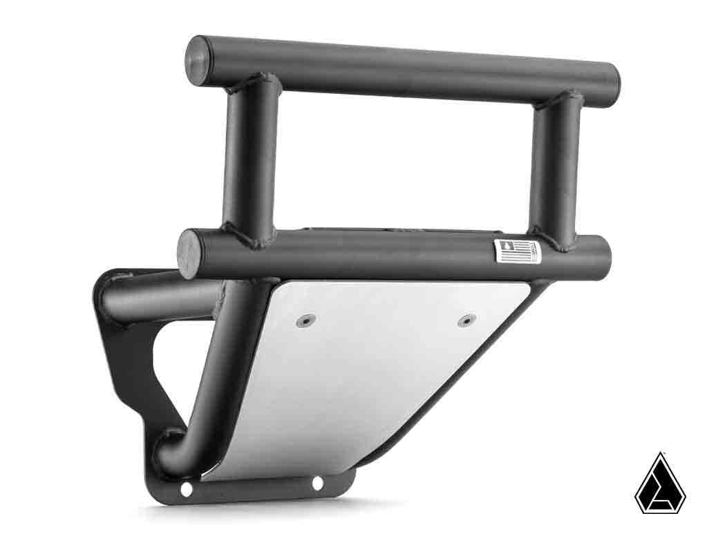 The Assault Industries Kawasaki KRX 1000 Interceptor Front Bumper features a black metal tubular design, integrated skid plate, matte finish, visible mounting points, and a small American flag detail. Set against a white background with a geometric logo a