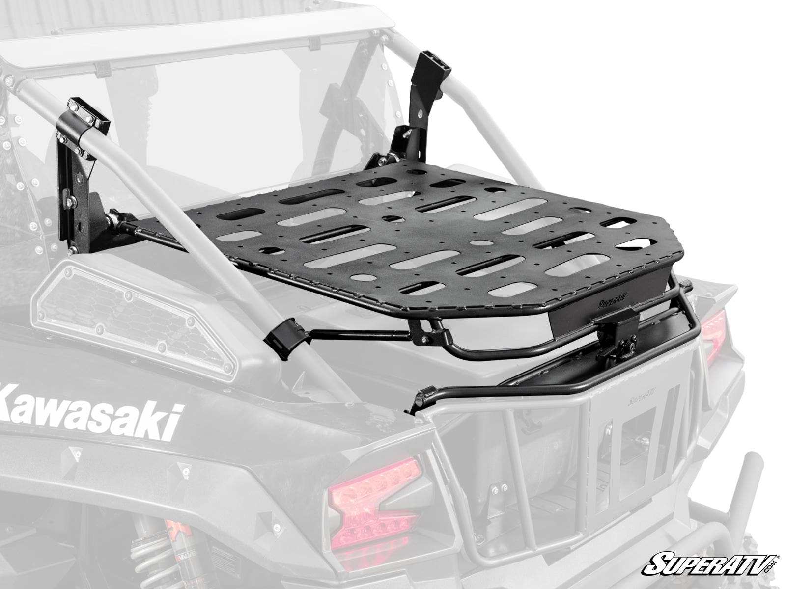 The Kawasaki Teryx KRX 1000 Cargo Rack Alpha is a black, heavy-duty cargo rack mounted on the rear roll cage, featuring multiple oval and round slots for securing gear and sturdy metal brackets supporting it above the cargo bed.