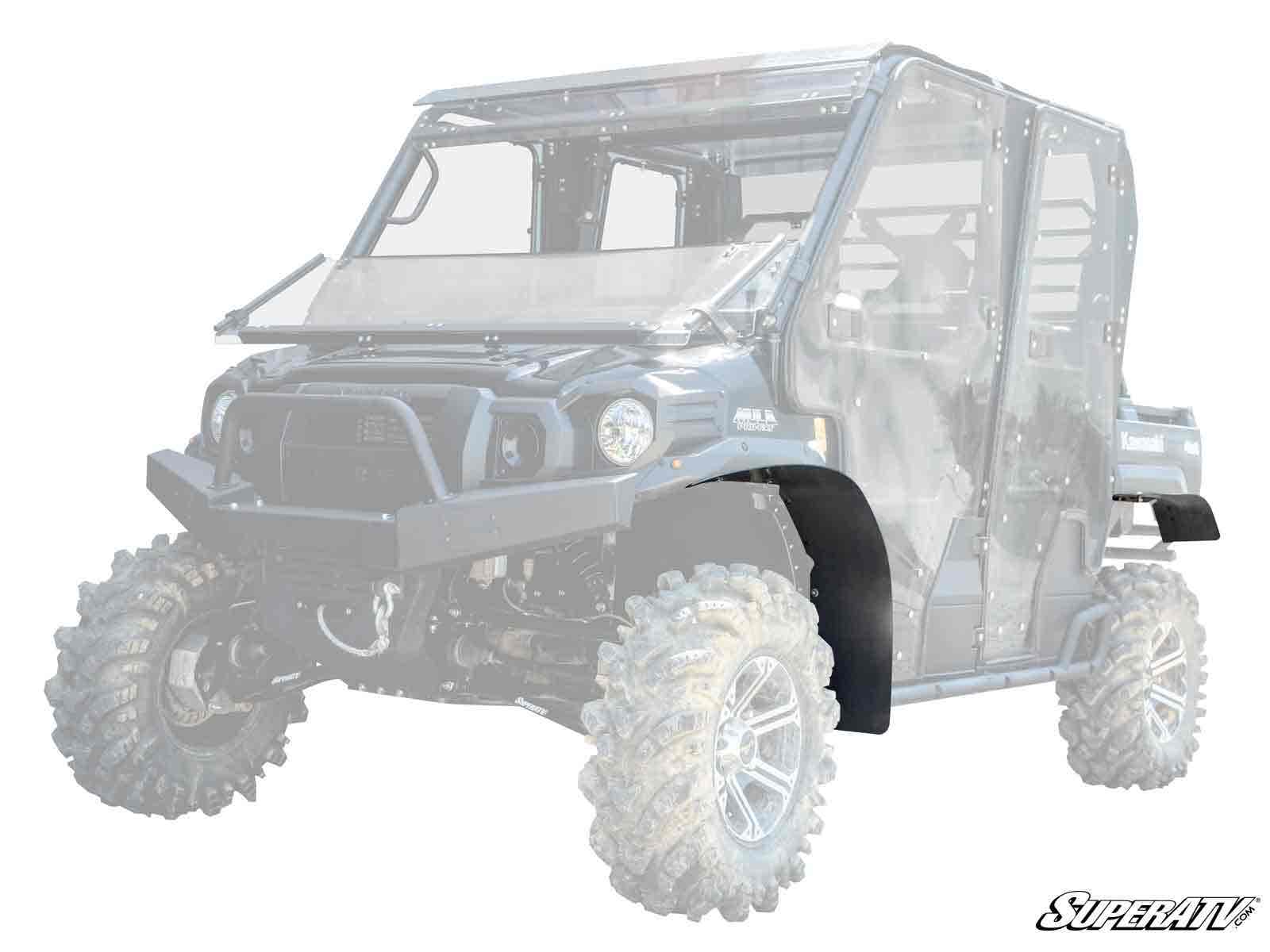A black Kawasaki Mule Pro Low Profile Fender Flare is featured on the front driver’s side wheel of a partially transparent off-road utility vehicle, with the “SuperATV” logo in the bottom right corner.