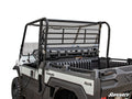 A rear view of a Kawasaki Mule Pro FX with a clear Rear Windshield, open cargo bed, black roll cage, and rugged design is shown against a white background. The SuperATV logo appears in the lower right corner.