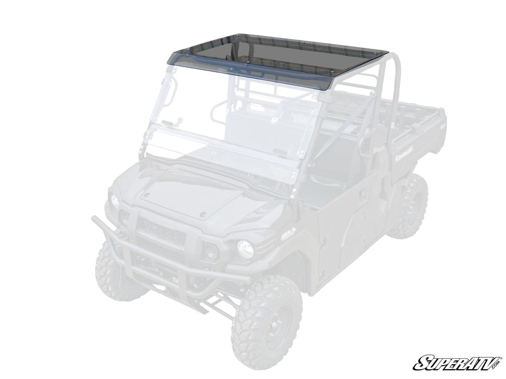 The Kawasaki Mule Pro Tinted Roof is shown installed on a partially transparent UTV, covering the cab above the front seats. The rest of the vehicle is faded to highlight the roof’s protective design.