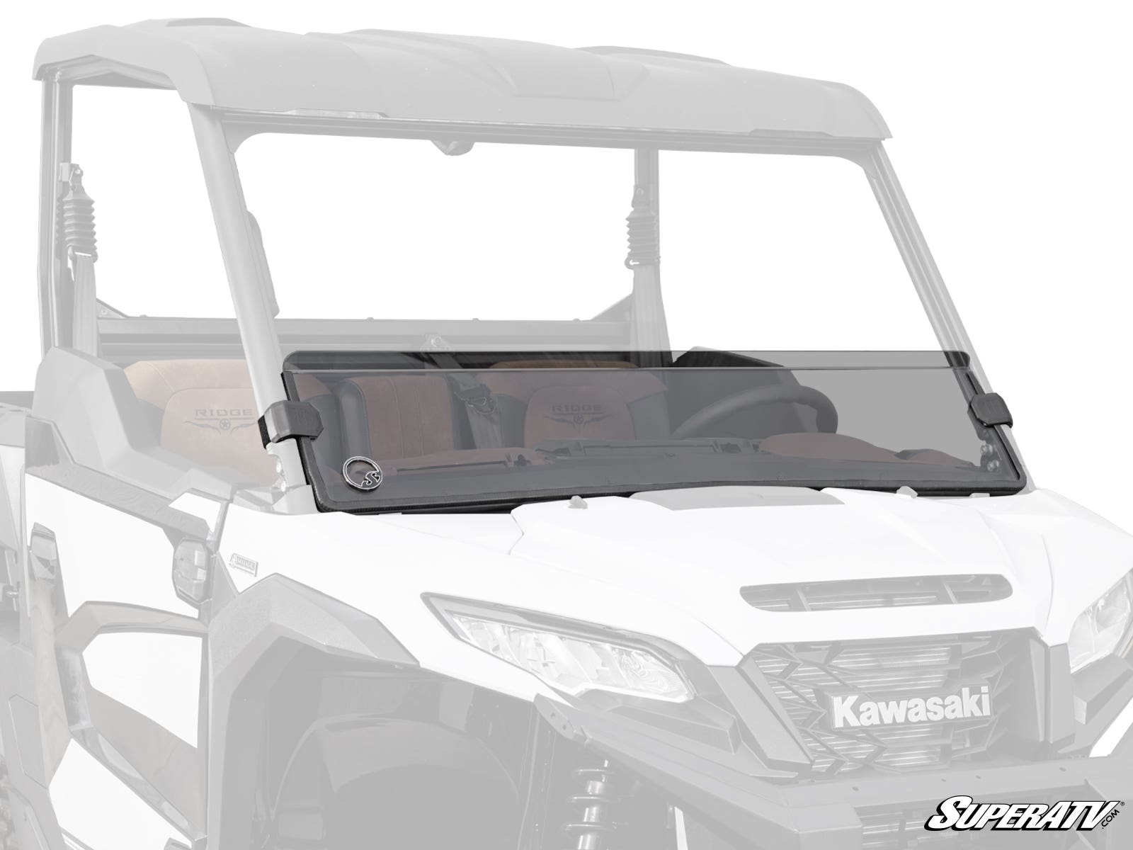 A Kawasaki Ridge Half Windshield is installed on a white Kawasaki side-by-side utility vehicle, covering the lower front and secured with two black brackets. The SuperATV logo is displayed in the bottom right corner.