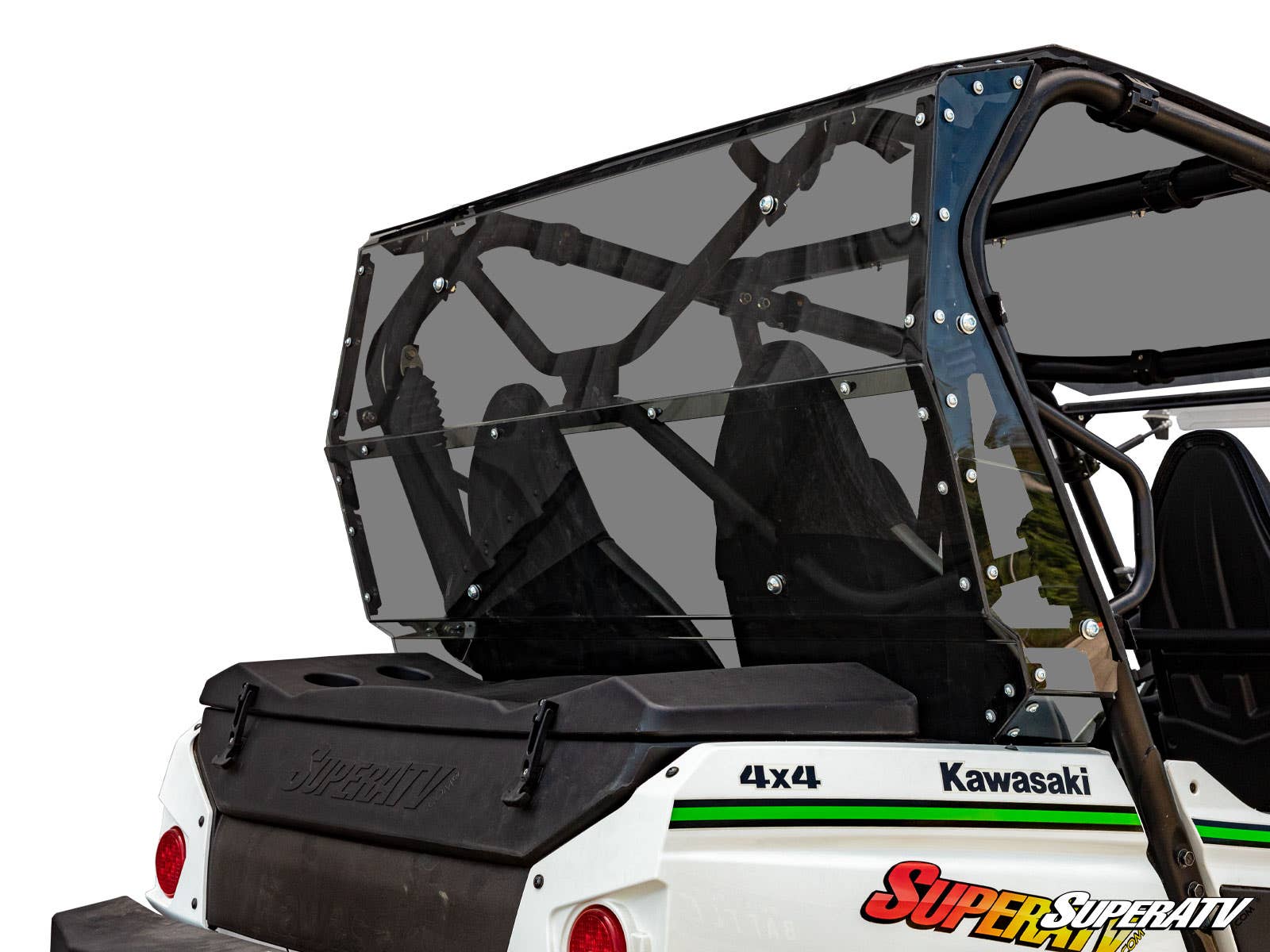 A close-up of a Kawasaki Teryx 4 S Rear Windshield on a white 4x4 side-by-side shows its tinted, securely attached rear windshield, black roll cage, and two seats; the SuperATV logo appears in the bottom right corner.